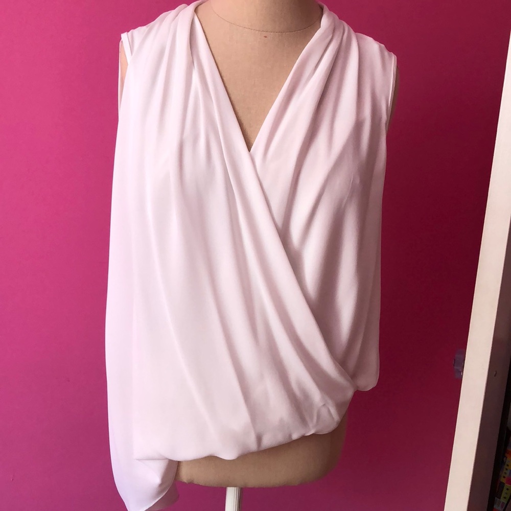 Asymmetrical white blouse worn once